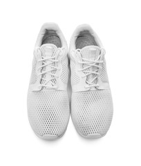 White unbranded sneakers.