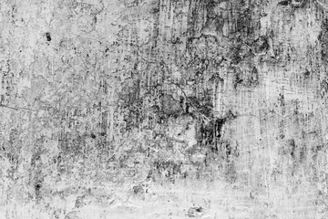 Wall fragment with scratches and cracks