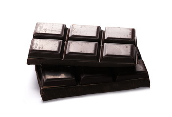 chocolate bars and chopped isolated on white