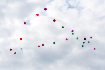balloons fly into the clouds