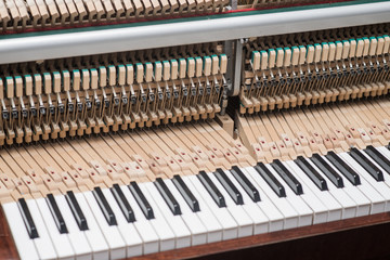 Vintage piano hammer mechanism. Prepare to repair