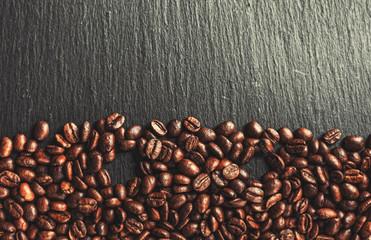 Coffee cup, spices and chocolate on wooden table texture with co