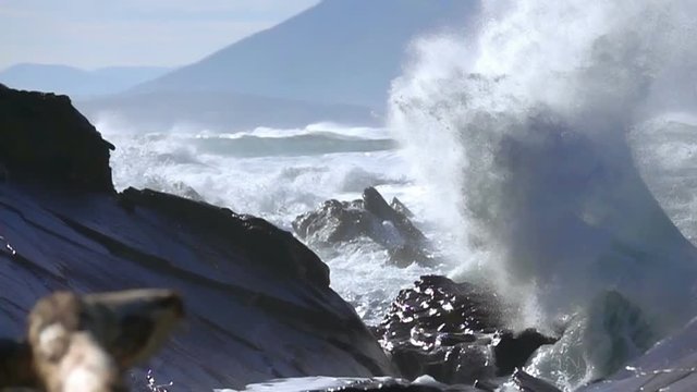 Ocean big wave storm giant wave on cliffs