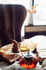 Dessert of pears and cottage cheese on wood