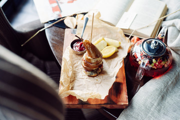 Dessert of pears and cottage cheese on wood