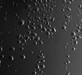 Water droplets on a black background