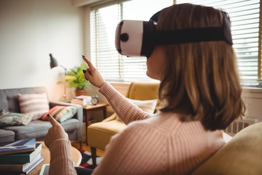 Woman using vr-headset glasses