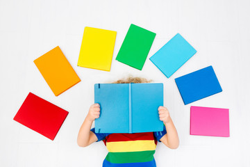 Child reading books. School for kids.