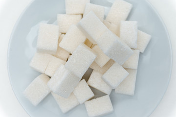 cubes of sugar in a plate