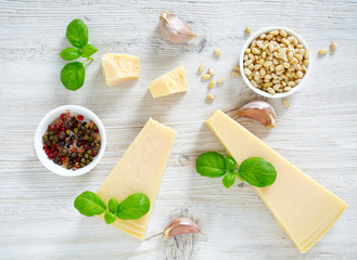 pesto ingredients on wooden surface