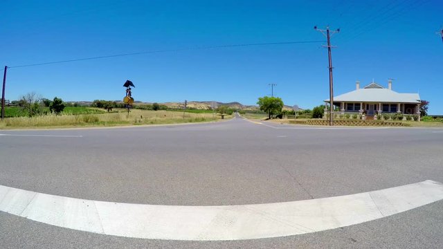 Barossa Valley vehicle POV, driving from intersection along Krondorf Road, South Australia.