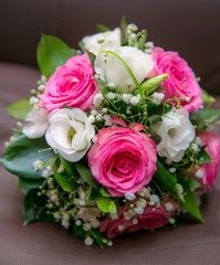 Wedding bouquet of red white flowers for the bride on the weddin