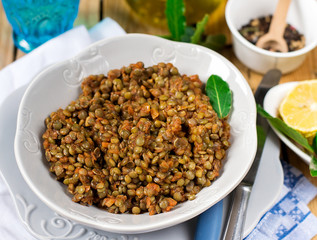 Lentil stew in tomato sauce with cinnamon and spices