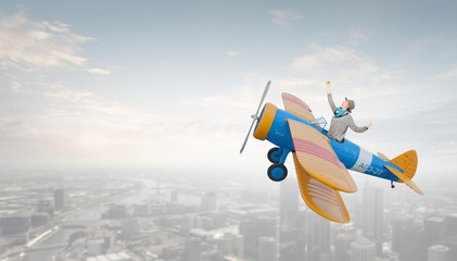 Woman in drawn airplane . Mixed media