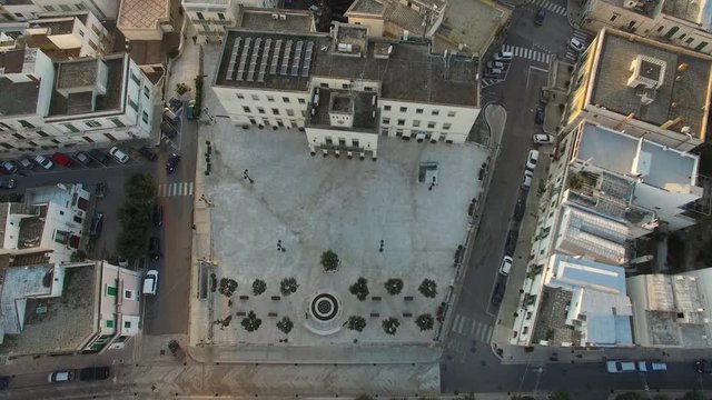 Flying over the city in Italy on a beautiful afternoon
Drone on the town in south Italy