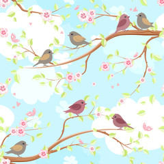 seamless texture with funny birds on branches blossom of cherry.