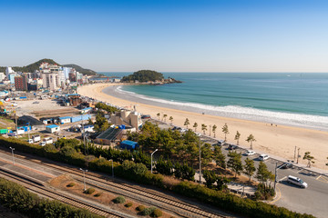 Fototapeta na wymiar Songjeong Beach and city Skyline in korea