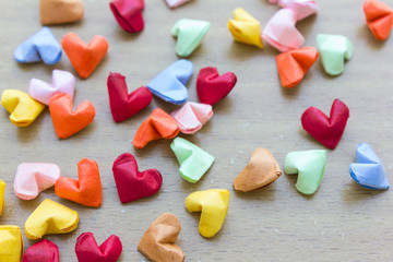 colorful paper hearts in top view