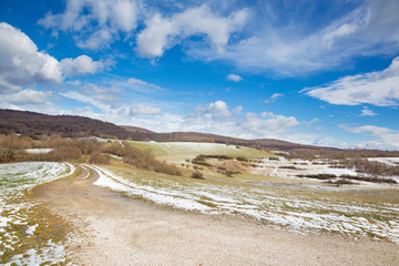 Slovakia - The road in the spring country of Silicka Planina plateau.