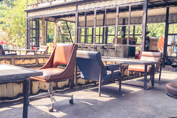 old table and chair in retro coffee shop