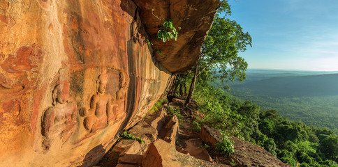 stone Carvings on the cliff in Srisaket province thailand