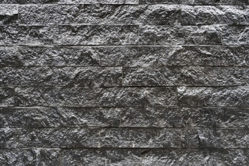 Wall tiles Grey stone tile wall pattern. background