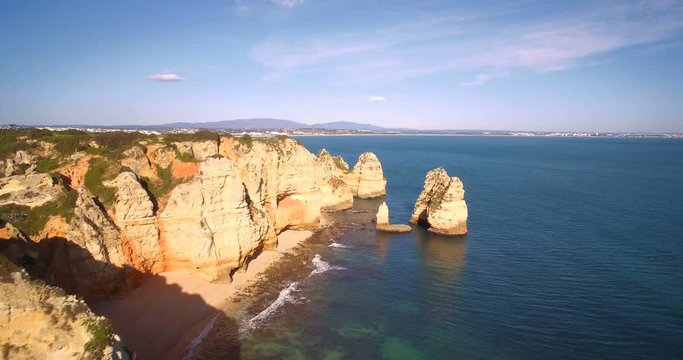 Aerial, Caves At Farol Da Ponta Da Piedade, Lagos, Portugal - Graded and stabilized version. Watch also for the native material, straight out of the camera.