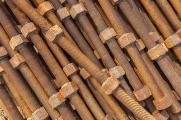 Close-up old rusty screw nuts and bolts use for industrial usage
