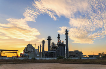 Fototapeta na wymiar Gas turbine electric power plant with sunset