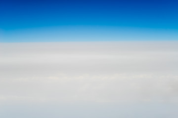 Top view on cloudscape with blue sky over it
