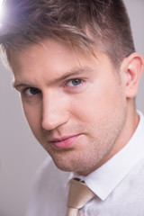Fototapeta premium Portrait of a young handsome man