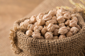Garbanzo beans or chickpeas in a bag with copy space.