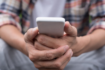 Young man using mobile smartphone