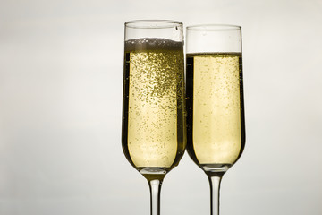 two glasses of sparkling white wine