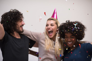 Obraz premium confetti party multiethnic group of people