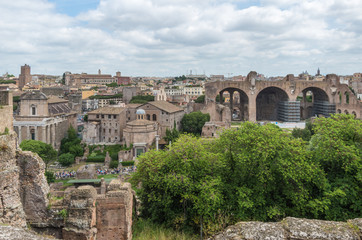 Fototapeta na wymiar The Roman Forum is a plaza surrounded by many ruins of ancient government buildings in the center of Rome