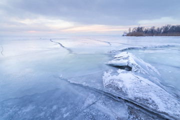 winter dawn on the river / bright photograph of a winter landsca