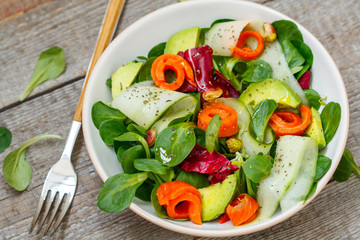 Salad bowl with fish, avocados and vegetables. Clean eating, vegetarian, raw, detox, dieting concept