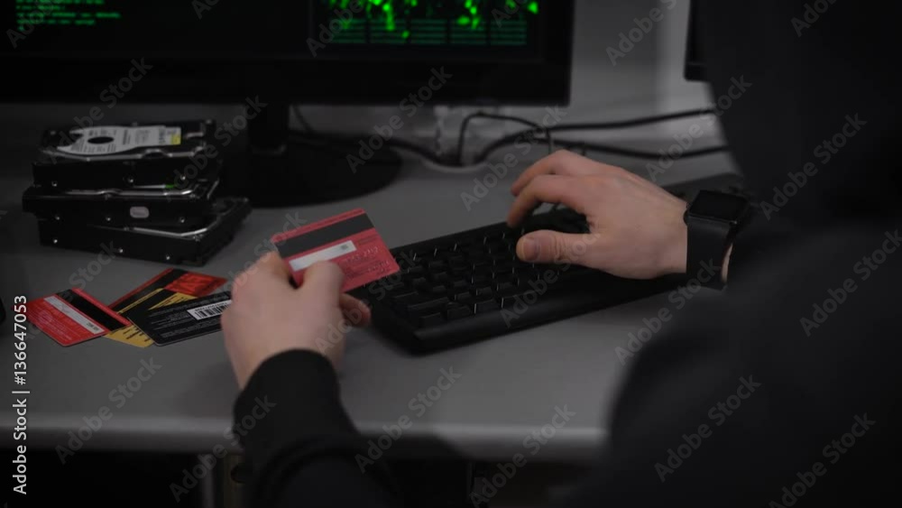 Poster hacker company. a hacker is preparing for breaking financial accounts. a man at a rapid pace enters 