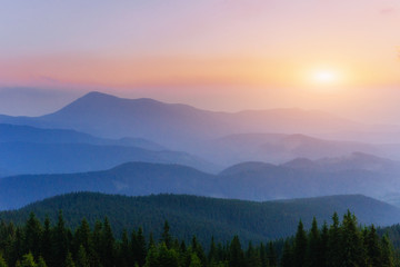 Naklejka na ściany i meble Fantastic sunset in the mountains of Ukraine.
