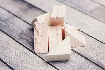 marshmallow, sweets on a wooden background
