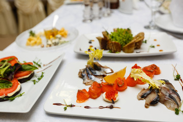 beautiful and tasty food on a plate on a wooden table