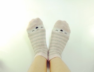 woman feet relaxing and comfort holiday concept background vintage toning