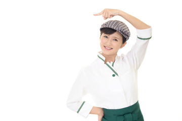 指示する笑顔のウェイトレス