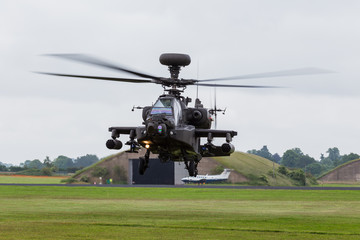 Fototapeta na wymiar Army Air Corp Apache turns during a hover