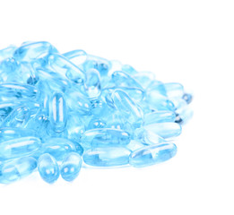 Fototapeta na wymiar Pile of blue softgel pills isolated