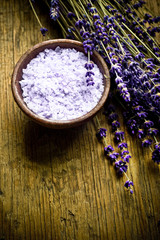 Obraz na płótnie Canvas Lavender herb and salt like a concept for wellness and crae for body and mind with copy space 