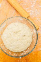 Cup with dough on board