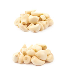 Pile of peeled garlic isolated