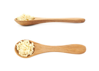 Spoon of minced garlic isolated